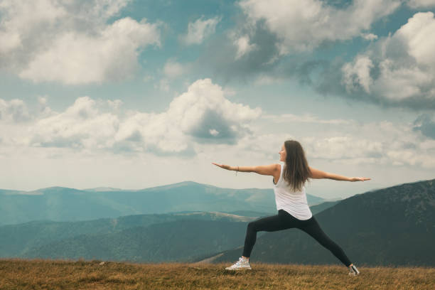 istock Yoga and meditation program in nature. 1644486985