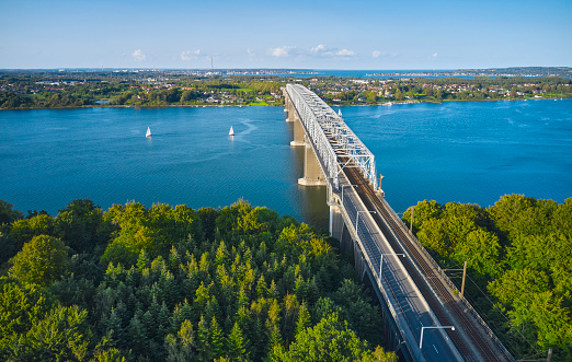 Drone point of view of the old bridge over Little Belt. Connection point on Funen. The bridge is a combined road and railway bridge.