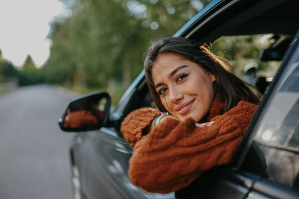 istock Woman sitting in a car 1644488101