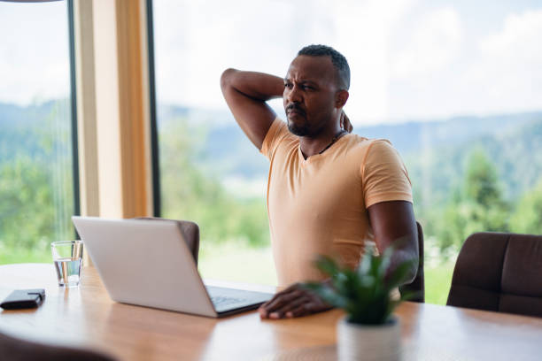 istock Man In Pain At Home While Using A Laptop 1644515508