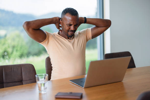 istock Man In Pain At Home While Using A Laptop 1644515789