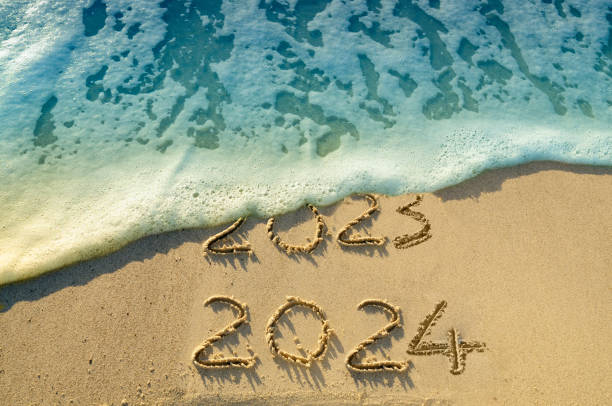 istock New Year 2024 on the beach. 1644523247