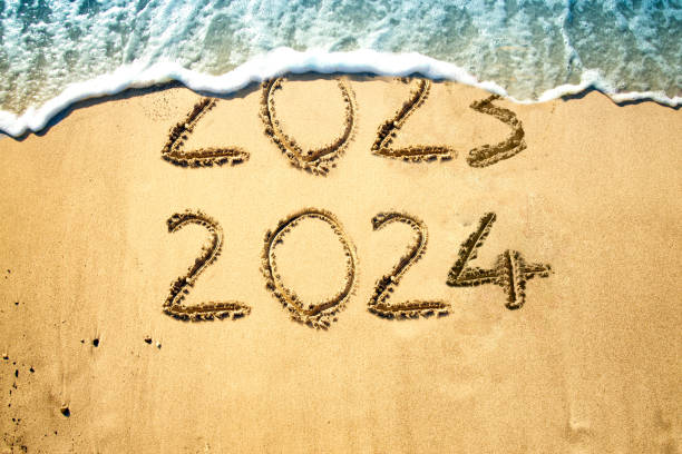 istock New Year 2024 on the beach. 1644523765