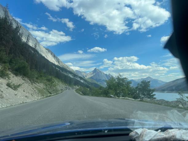 istock Car View of Mountains along the road 1644524856