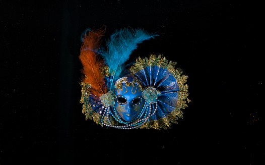 venetian carnival colorful mysterious masquerade mask isolated on black background
