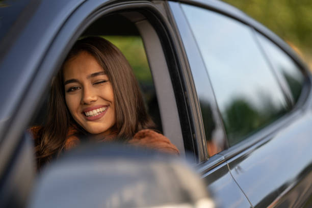 istock Beautiful woman winking at you 1644538789