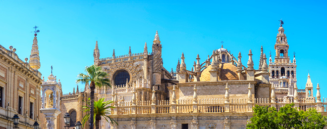 Panoramic view of the south side of the Seville Cathedral. Seville, Andalusia, Spain.