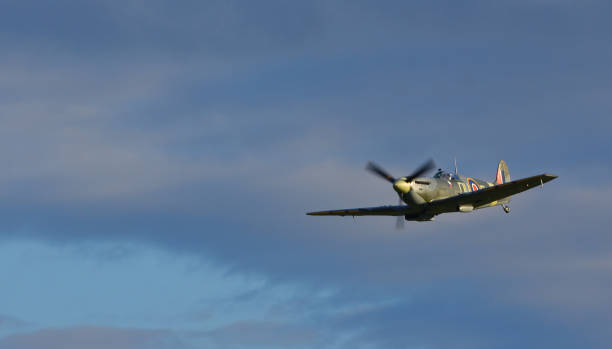 Vintage Supermarine Spitfire MK Vc G-AW11 AR501  in flight  close up. Ickwell, Bedfordshire, England - September 06, 2020:Vintage Supermarine Spitfire MK Vc G-AW11 AR501  in flight  close up. spitfire stock pictures, royalty-free photos & images