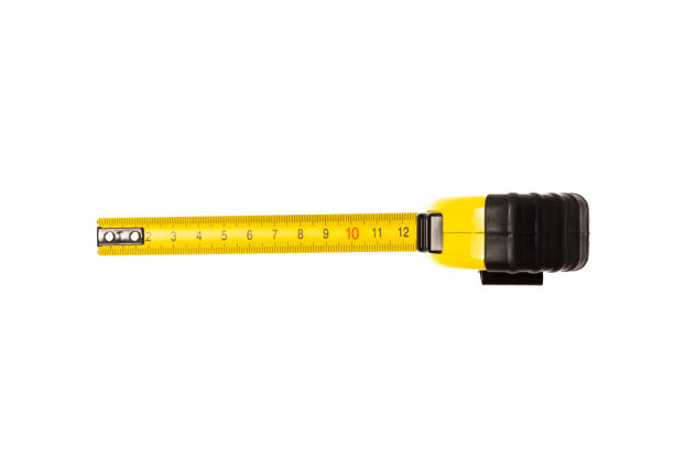 istock Yellow measuring tape isolated on white background. 1644573582