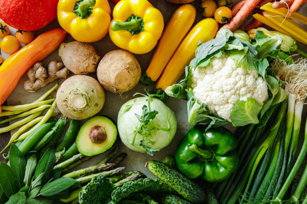 istock Full frame of different types of fresh vegetables on table 1644577818