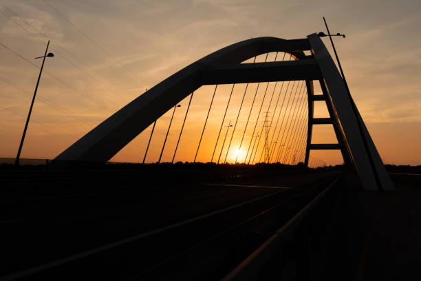 istock The Pentele Bridge over the Danube at sunset 1644583303