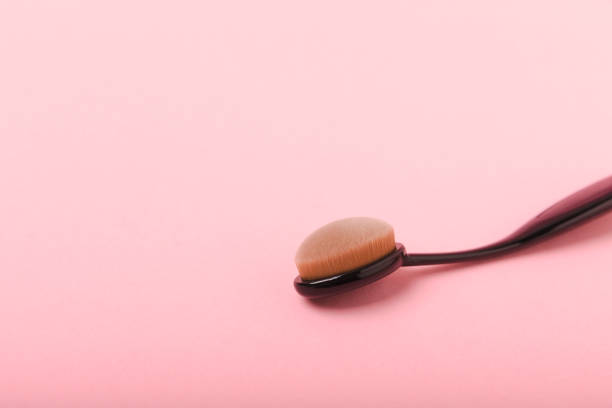 istock Cosmetic product for makeup. Makeup brushes on a  background. Creative fashion concept. Collection of cosmetic makeup brushes, top view, banner.Flat lay. 1644597995