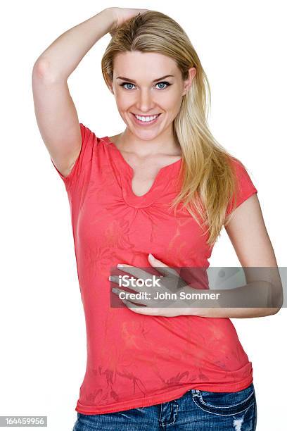 Hermosa Mujer Tocando Su Estómago Foto de stock y más banco de imágenes de Abdomen - Abdomen, Abdomen humano, Frotar