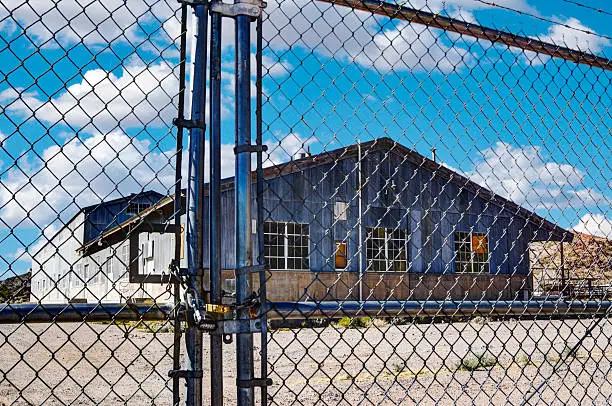 Photo of Fenced off Abandoned Factory