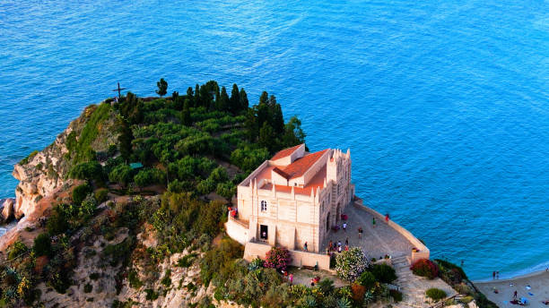 istock Tropea Serenity: Turquoise Waters and Vibrant Homes 1644627661