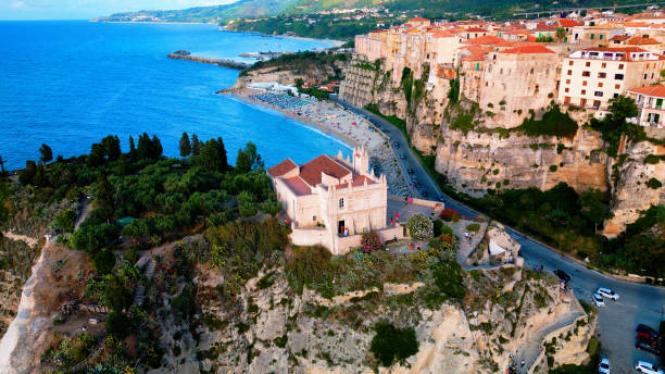 istock Tropea Serenity: Turquoise Waters and Vibrant Homes 1644628789