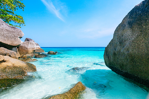 istock Tropical beach with large boulders and crystal clear water. Similan islands. 1644662021