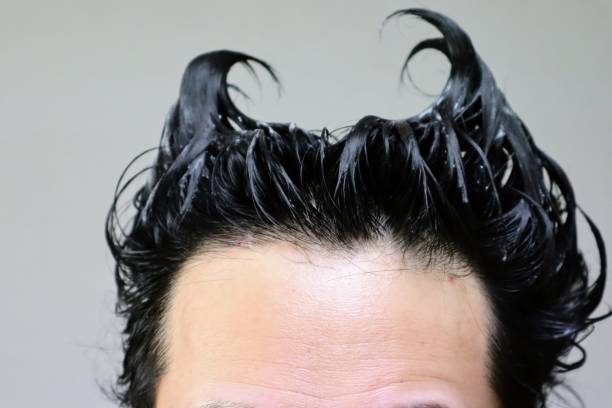 istock Japanese man in shampoo 1644711268
