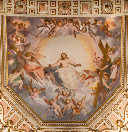 Genova - The ceiling fresco of Jesus as the Judge amng the angels and symbols of Crucifixion in the church Chiesa di Santa Caterina by Giovan Battista Castello (1509 - 1569).