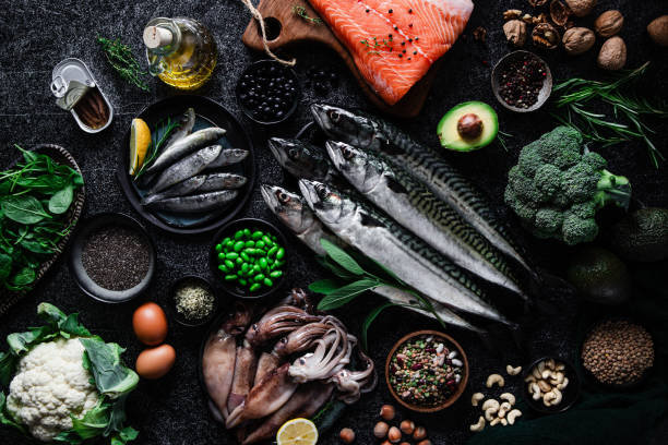 istock Table top view of a delightful seafood feast on the kitchen table 1644736200
