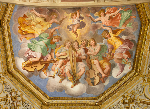 Genova - ling fresco of Choir of angels with the music instruments in the church Chiesa di Santa Caterina by Andrea Semino (1525 - 1595).