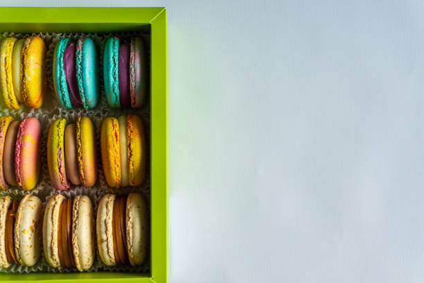 istock colorful macaroons in the box. Macarons. Copy space, top view 1644762961