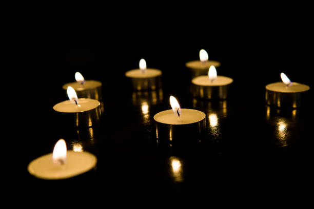 istock Scented candles in a dark room 1644765820