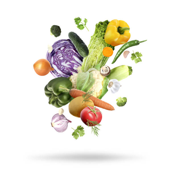 istock Many fresh vegetables, mushroom and herbs falling on white background 1644779974