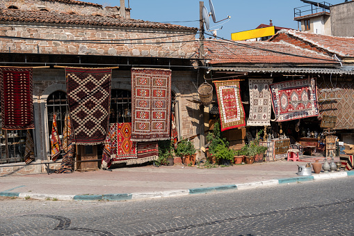 Kruja old bazar with traditional carpet in  Albania in afternoon sky 3 march 2024