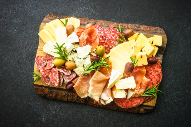 istock Antipasto platter with jamon, salammi and cheese assortment. 1644782766