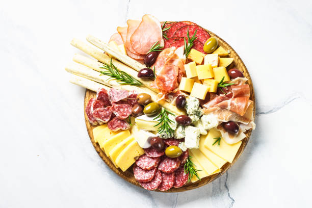 istock Antipasto platter with jamon, salammi and cheese assortment. 1644784450