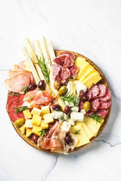 istock Antipasto platter with jamon, salammi and cheese assortment. 1644784456