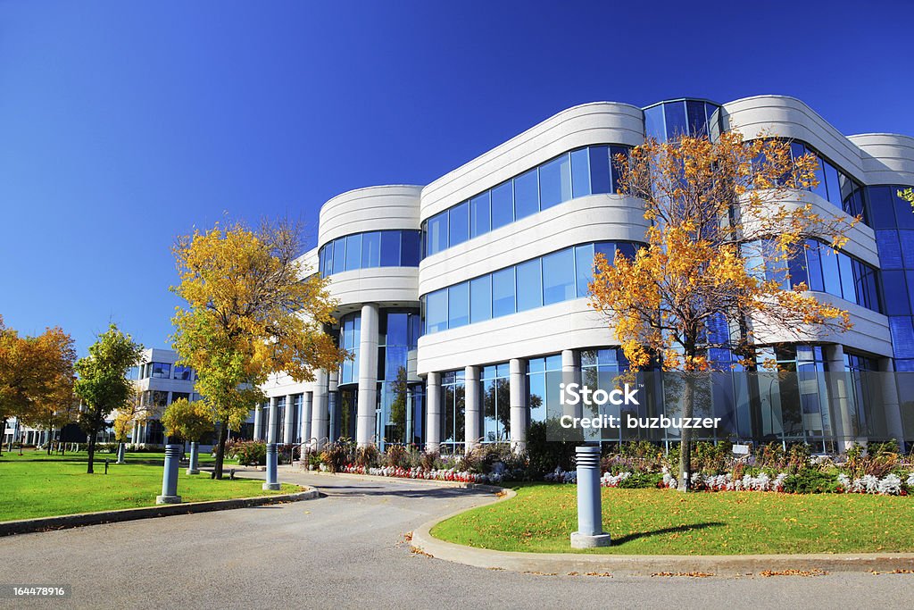 Colorful Corporate Building at Fall  Office Building Exterior Stock Photo