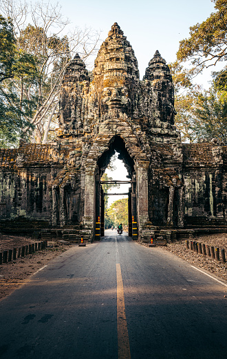 road leading through the North Gate of Angkor Thom, Cambodia\nAngkor Wat Area, Cambodia, South East Asia.