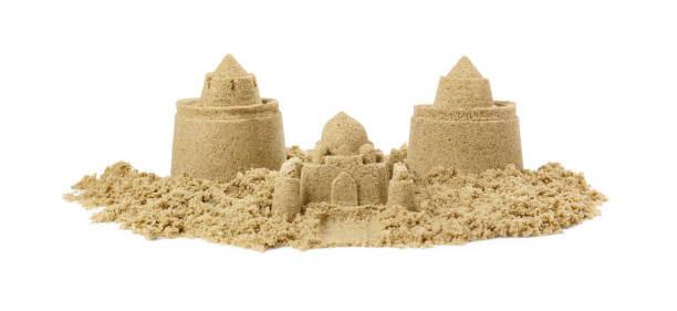 istock Pile of sand with beautiful castles isolated on white 1644793523