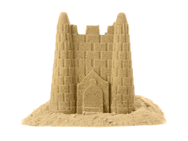 istock Pile of sand with beautiful castle isolated on white 1644793555