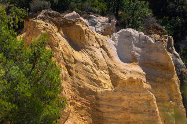 istock Abstract Rustrel canyon ocher cliffs landscape. Provencal Colorado near Roussillon, Southern France. 1644804839