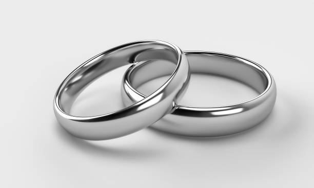 istock Illustration of two wedding silver rings. Unity concepts 1644808130