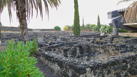 Excavated foundations of houses and synagogues of the ancient city of Capernaum in Israel
