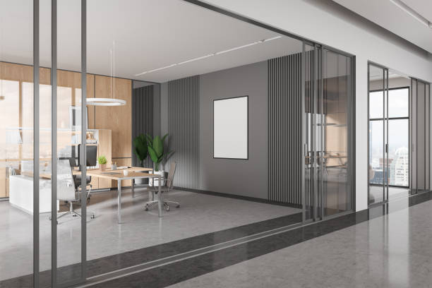 istock Modern business interior desk and armchairs, panoramic window. Mockup frame 1644845916