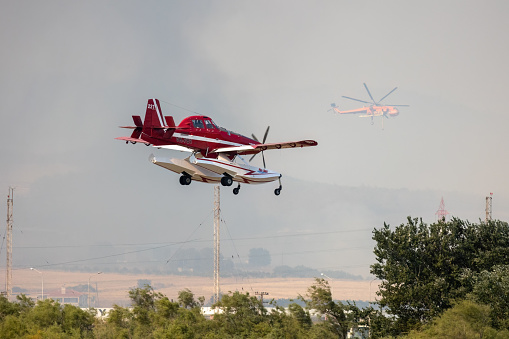Massive forest fire in Alexandroupolis Evros Greece, near airport and Apalos, emergency situation, helicopter aerial firefighting, 20.8.2023.