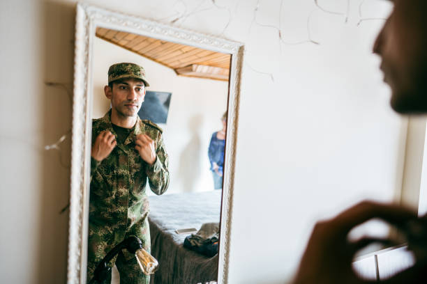 istock Soldier getting ready ready to leave at home 1644853462
