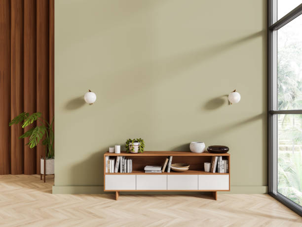 istock Cozy chill room interior with sideboard, decoration and window. Mockup wall 1644867366