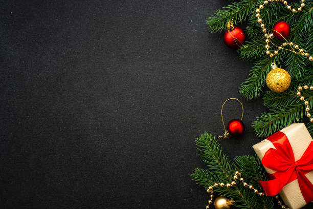 istock Christmas flat lay background. Present box, fir tree and holiday decorations. 1644871549