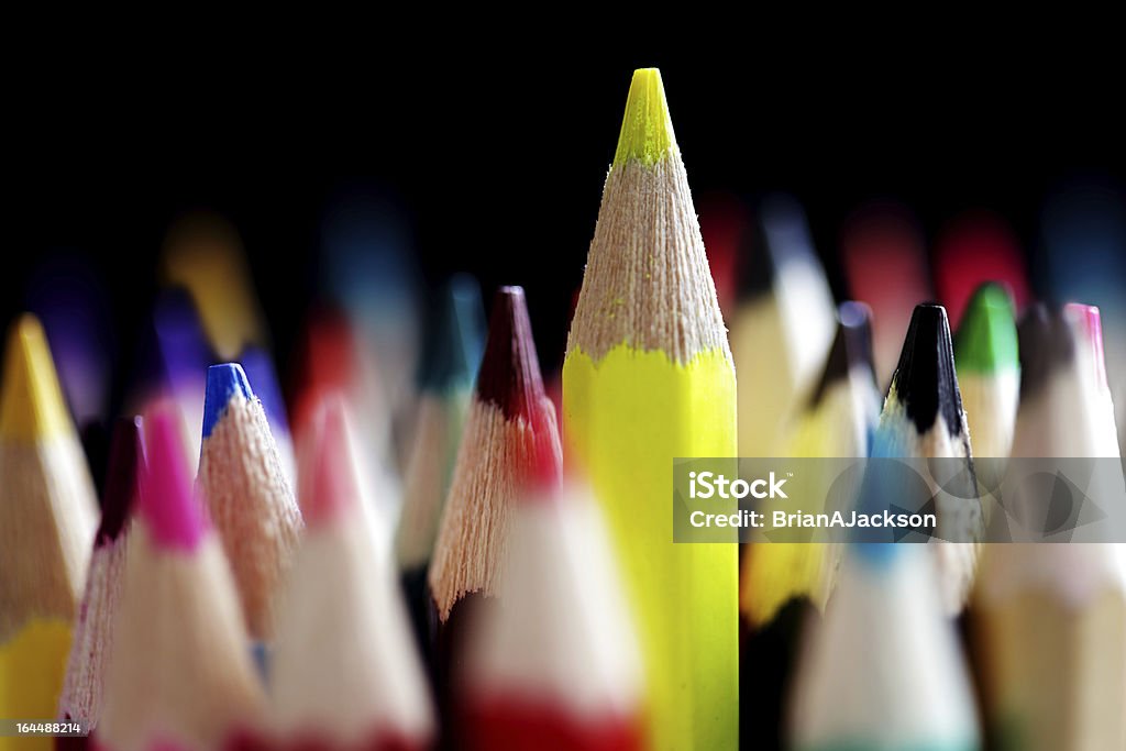 Standing out from the crowd Standing out from the crowd concept with colored pencils Art Stock Photo