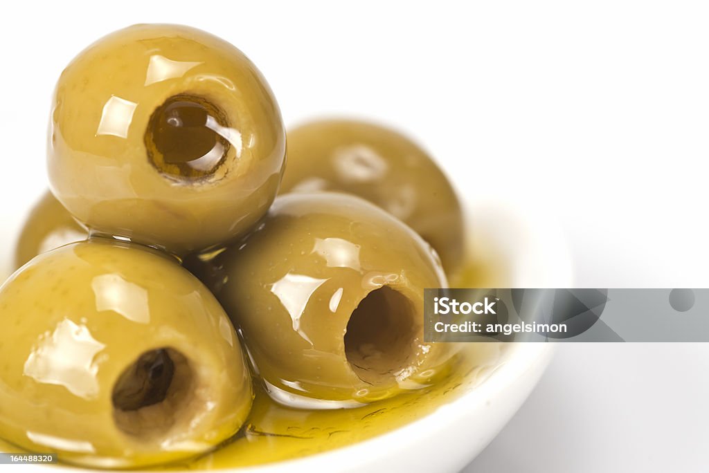 Pitted Oliven auf weißem Hintergrund - Lizenzfrei Abnehmen Stock-Foto