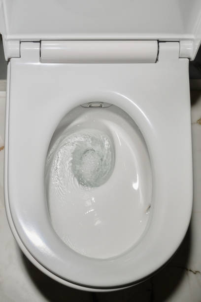 istock Toilet, flushing water. 1644895588