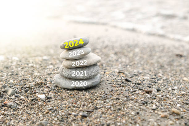 istock Happy new year, 2024 replace old 2023. New Year 2024 is coming concept idea on beach. Creative photo image can be used as display, printed canvas, website banner, social media post 1644920684