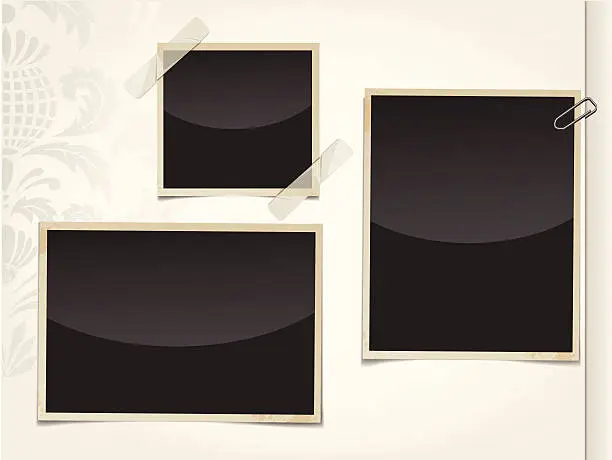 Vector illustration of Three retro black photos taped and clipped to an album page