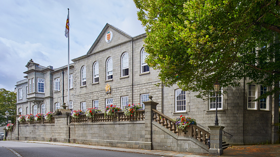 Image of the States of Guernsey chamber building. Guernsey is a major touristic attraction and fianance centre. Taken 5 July 2023